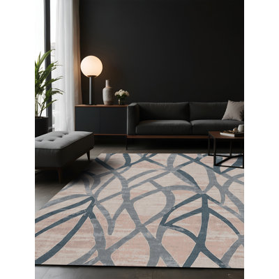 Tapis gris soyeux et moelleux