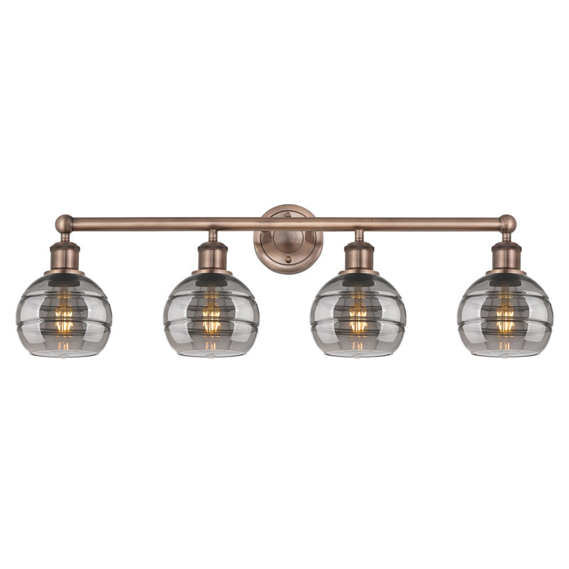 Éclairage pour meuble-lavabo à 4 lumières Chartoff, Gris fumée clair, Cuivre antique