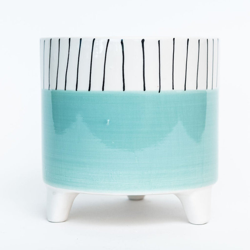 Jardinière à pieds bleu turquoise avec rayures blanches et noires