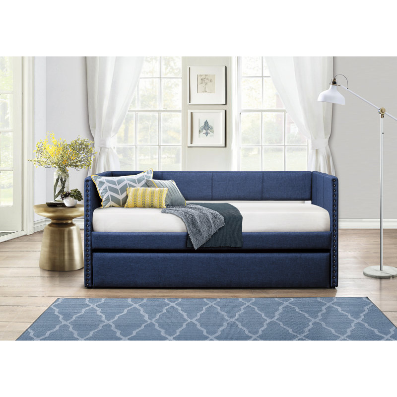 Lit de jour bleu en tissu avec structure en bois et lit gigogne escamotable pour le soutien de la maison