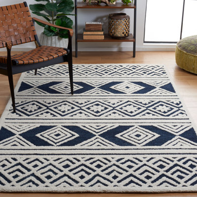 Brizendine Hand Tufted Wool/Cotton Striped Rug in Ivory/Blue