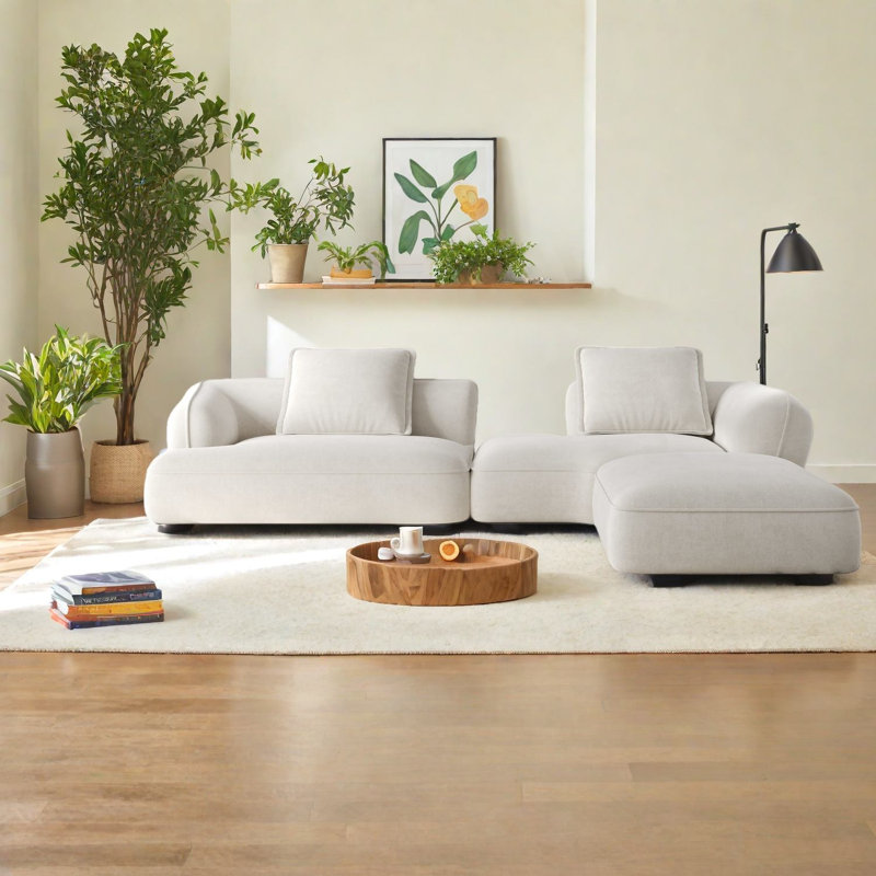 Canapé modulaire spacieux en mousse haute densité, parfait pour le salon