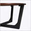 Table basse en bois massif d'acacia avec une construction durable et une esthétique moderne, parfaite pour les salons et les patios.