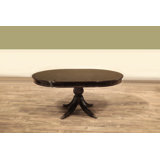 Round Walnut Dining Table With Self-storing Leaf Seats 2-4