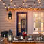 Nyomie 1-Light Black Dusk to Dawn Motion Sensor Outdoor Wall Lantern Sconce,Built-In GFCI and USB Outlets