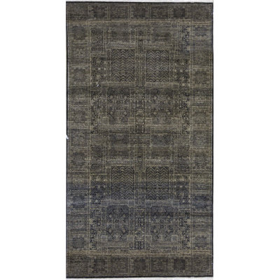 Tapis noir et doré de haute qualité noué à la main
