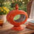 Cia Candle Holder, 12 Inch Oval Shape, Red Iron Frame With Glass Center