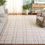 Tapis beige / ivoire touffeté à la main Ilaya-190205673