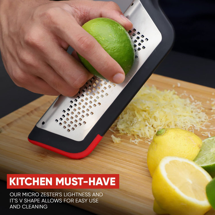 https://assets.wfcdn.com/im/76577176/resize-h755-w755%5Ecompr-r85/2436/243612159/Soft+Touch+Handle+Lemon+Zester+And+Cheese+Grater+-+Ideal+For+Shredding+Cheese+And+Zesting+Citrus+With+Ease%21.jpg