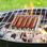 Hotdog Roller for Grill - Stainless-Steel Rolling Rack with Extra-Long Wooden Handle and 5 Hotdog Capacity - Sausage Roller for BBQ by Great Northern