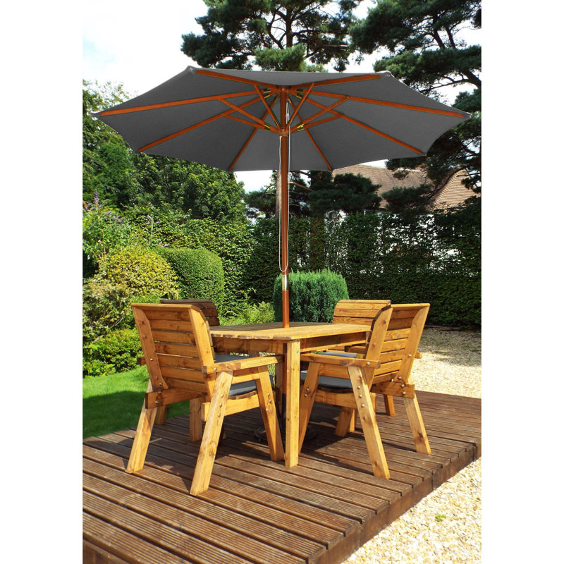 Feldman 4 - Person Wood Patio Dining Set with Rectangular Table , Cushions Included, Grey
