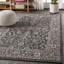 Tapis intérieur / extérieur noir / gris Mark tissé texturé vigne et bordure-318467439