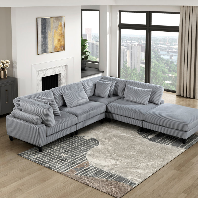Fauteuil d'angle en velours côtelé gris