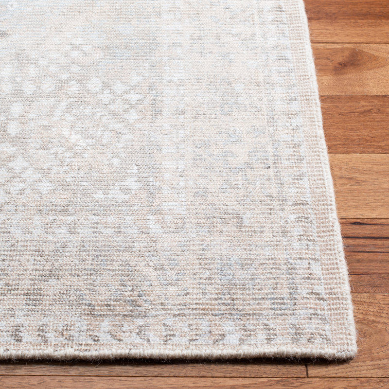 Beige and Sand 9' x 12' Hand-Tufted Wool and Viscose Rug