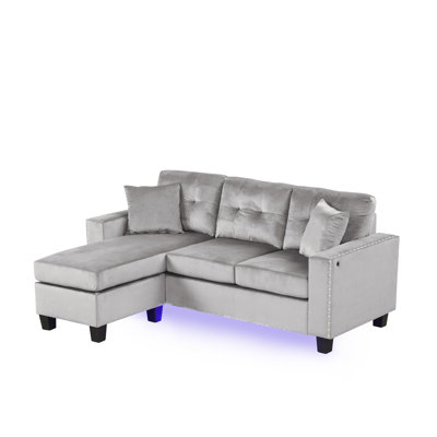 Sorenza 74"W Black PVC Reversible Sectional Sofa Chaise With LED Light, USB Port, Nailhead Trim, Throw Pillows, Tufted Cushion by Lilola Home