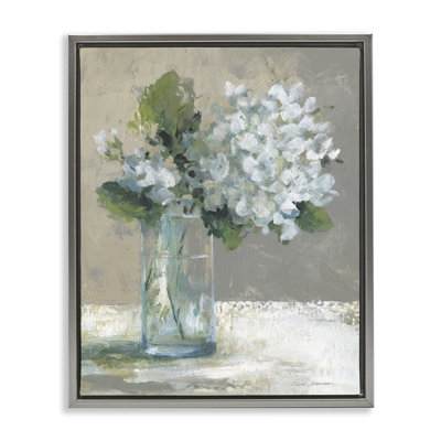 Hortensias blancs sereins dans un cadre flottant en verre, design par Carol Robinson