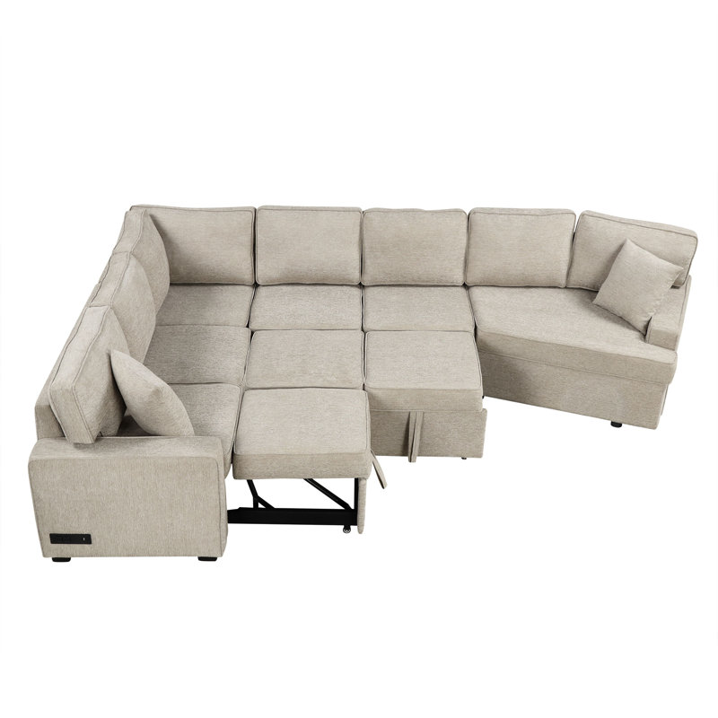 Canapé modulaire en L avec lit escamotable Roomfitter, dispositifs de chargement intégrés et porte-gobelets pratiques pour le confort du salon