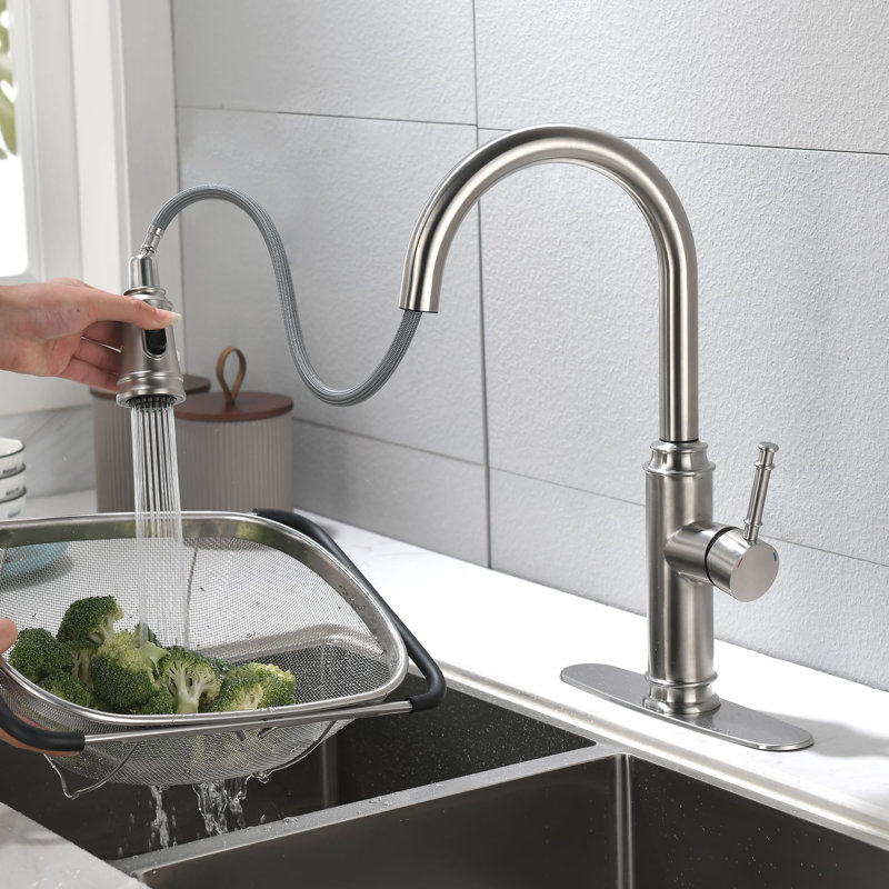 Robinet de cuisine à poignée simple rétractable avec douchette latérale