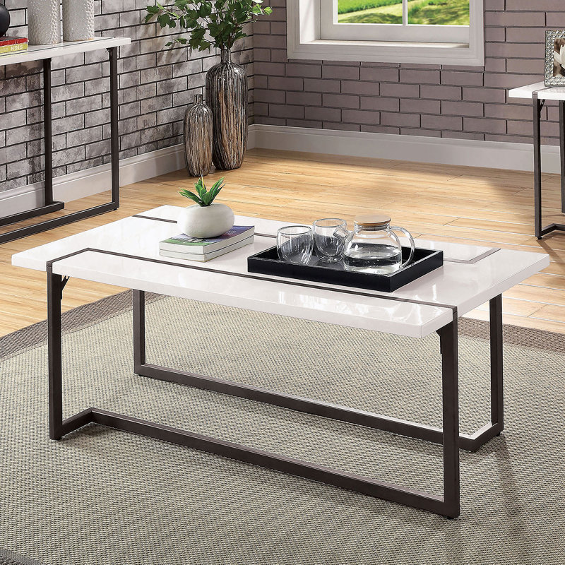 Table basse moderne de style contemporain avec pieds extensibles, plateau en laque ultrabrillante et structure en acier au fini blanc et bronze