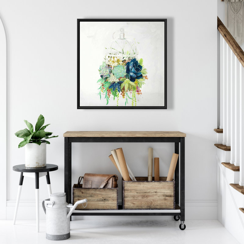"Cage à oiseaux avec cactus"