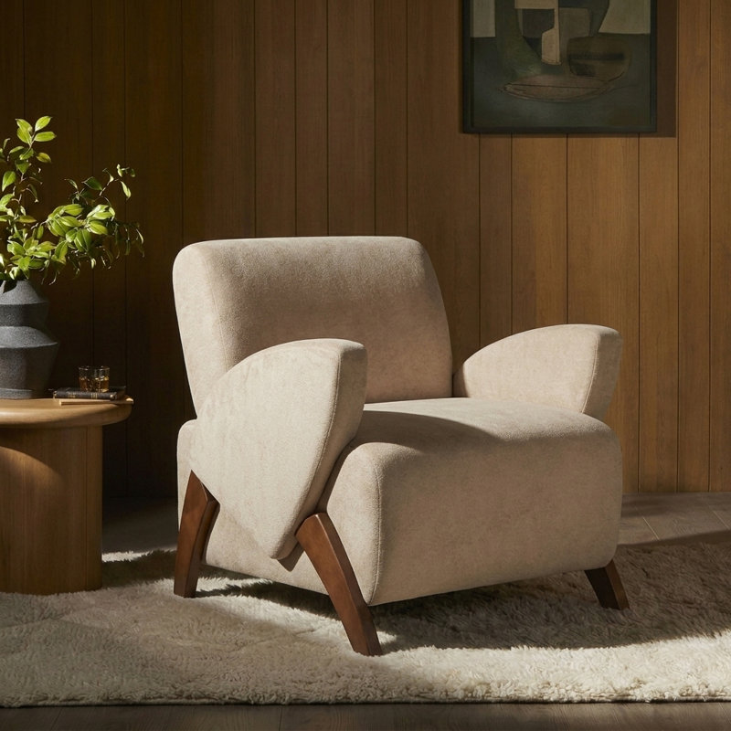 Fauteuil d'appoint confortable en velours Aura avec pieds en bois massif pour le salon