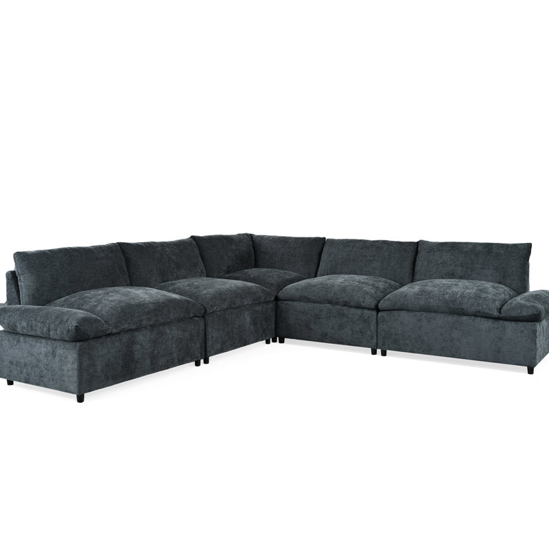 Canapé modulaire moderne gris foncé avec coussins et espaces de rangement dissimulés