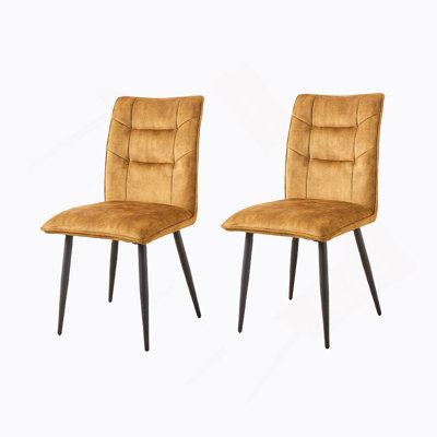 Ensemble de deux chaises de salle à manger contemporaines avec sièges rembourrés et cadres en fer, idéales pour les environnements de salle à manger et de travail modernes.