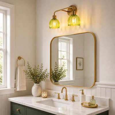 Applique murale à 2 lumières en laiton doré pour salle de bain, avec abat-jour en verre vert en forme de fleur et douille E26 (ampoules non comprises).