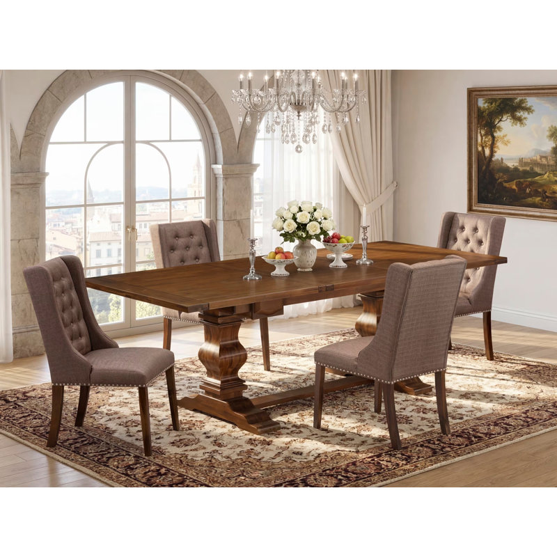 Cet ensemble de salle à manger 5 pièces comprend une table de salle à manger rectangulaire avec rallonge amovible et 4 chaises rembourrées en tissu brun, noyer antique 
