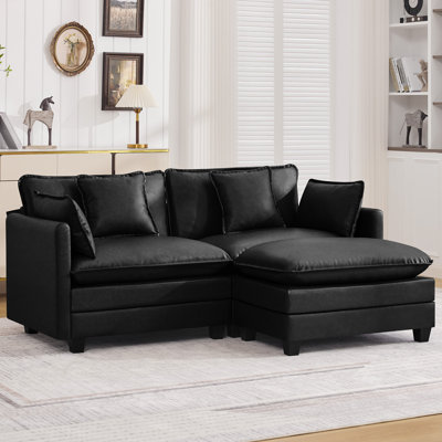 Canapé modulaire rembourré en similicuir avec repose-pieds