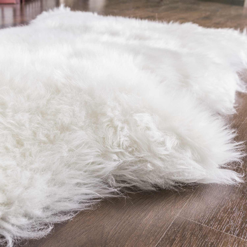 Tapis zone ivoire naturelle en peau mouton