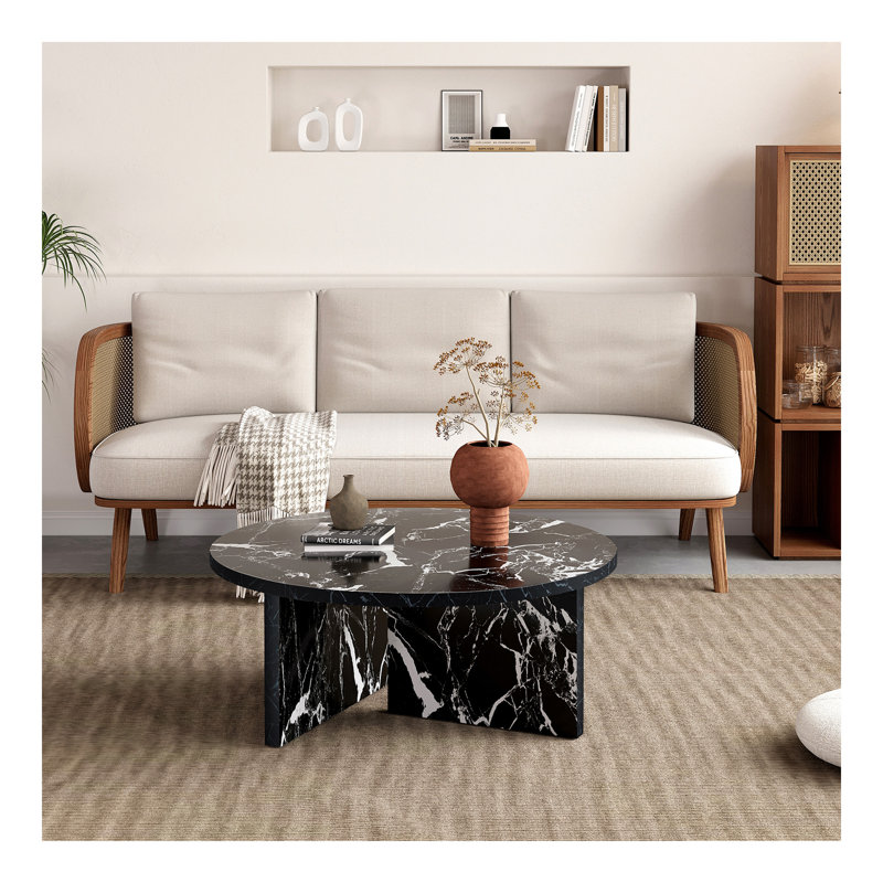 Table basse ronde polyvalente en panneau de fibres à densité moyenne noire pour divers styles d'intérieur, présentant un minimalisme moderne et un charme nordique