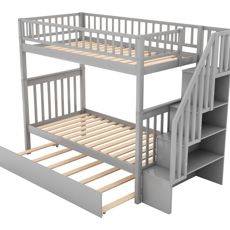 Lit simple superposé au dessus d'un lit gigogne gris, 4 tablettes de rangement, matelas d'une épaisseur de 6 po et d'une épaisseur de 6 pi