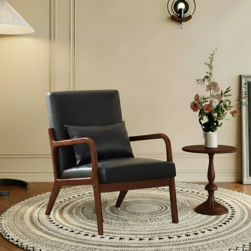  23.4" W Mid-Century Modern Upholstered Faux Leather Accent Armchair with Pillow, Solid Wood Frame, Matte Black