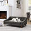 Animal gris foncé foncé avec accoudoir supplémentaire et lit pour chien au design contemporain