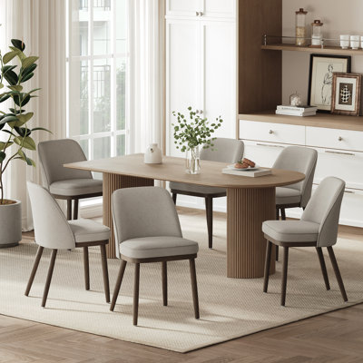 Chaise de salle à manger rembourrée moderne avec dossier courbé et pieds en bois massif