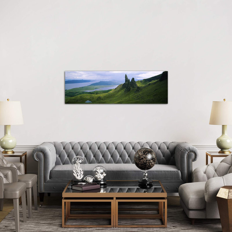 Old Man Of Storr With A High-Angle View Of Loch Leathan, Isle Of Skye, Inner Hebrides, Scotland by Panoramic Images - No Frame Panoramic Print on Canvas