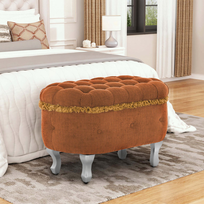 Banc de rangement capitonné avec bordure à pampilles et pieds en métal, Orange