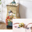 Commode d'appoint sept tiroirs en feuille d'or peinte à la main