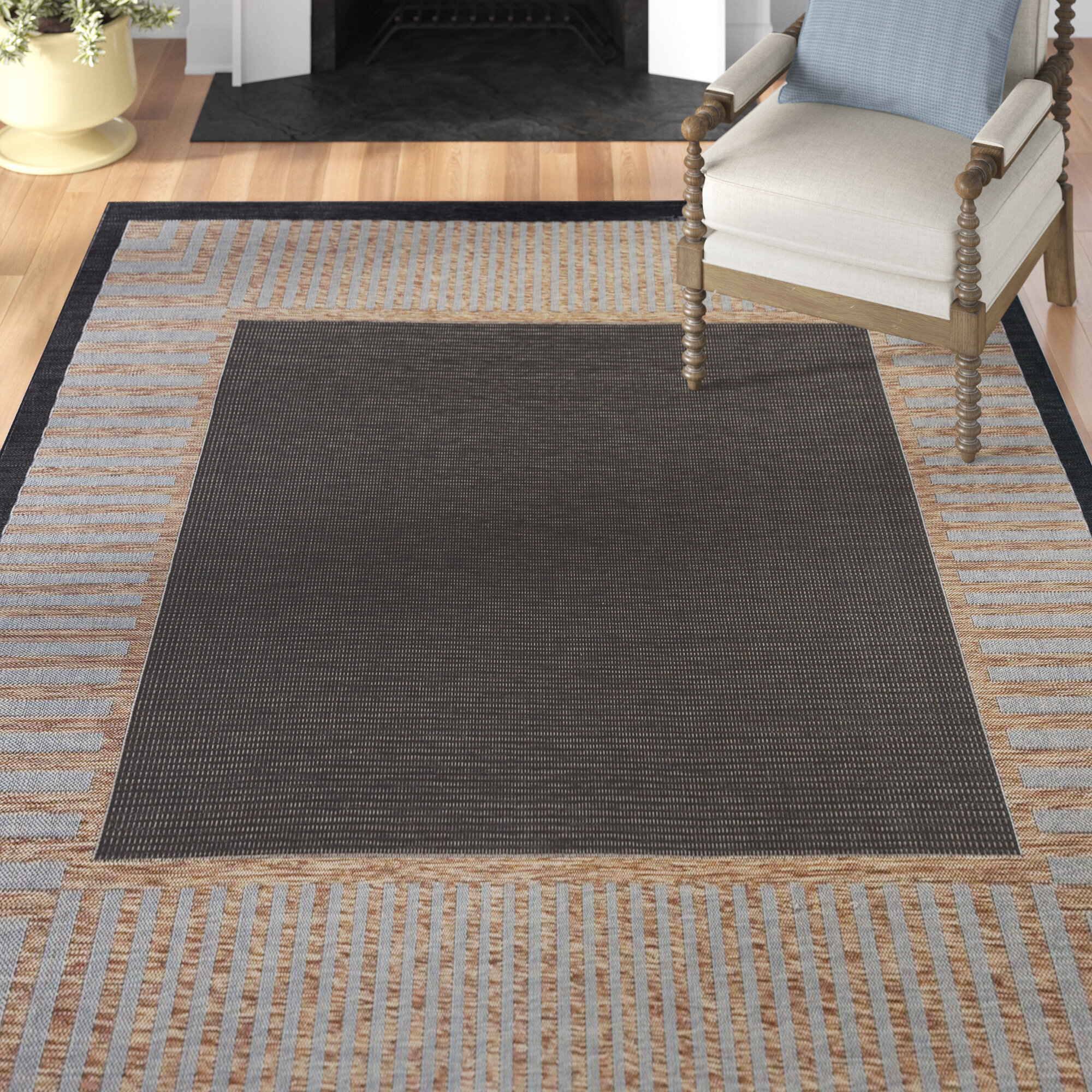 https://assets.wfcdn.com/im/76713715/compr-r85/1394/139424101/daponte-indooroutdoor-rug.jpg