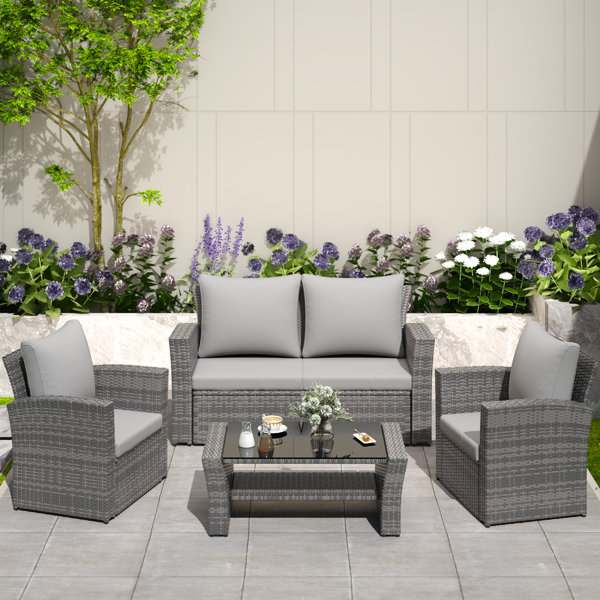 4 Piece Rattan Sofa Seating Group With Back&Seat Cushions Ebern Designs Frame Color/Cushion Color: Gray Frame/Dark Gray Cushion