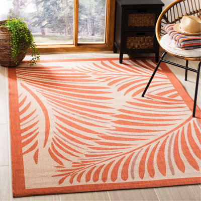 Tapis floral beige / terracotta