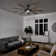 Gentry 85" 9 - Blade LED Windmill Ceiling Fan with Wall Control and Light Kit Included