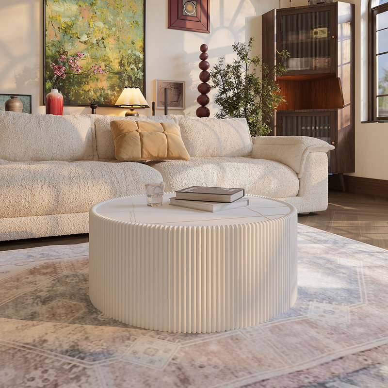 Table basse moderne en cuir fritté avec dessus en pierre