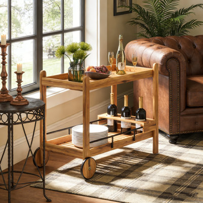 Louisiana Bar Cart with Slat Design, Acacia Wood Construction, Wine Storage, and Smooth Mobility for Entertaining.