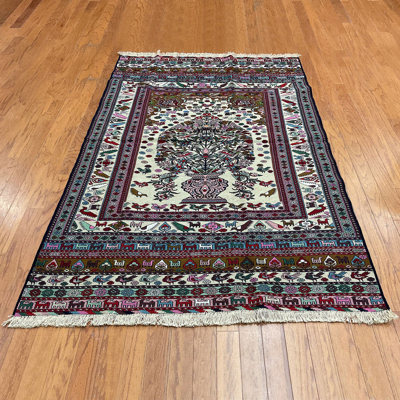 Tapis oriental rouge / vert / ivoire en laine 4 pi 4 po x 6 pi 5 po Oriental