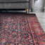 Tapis rouge à motif tissé rétro-571256304