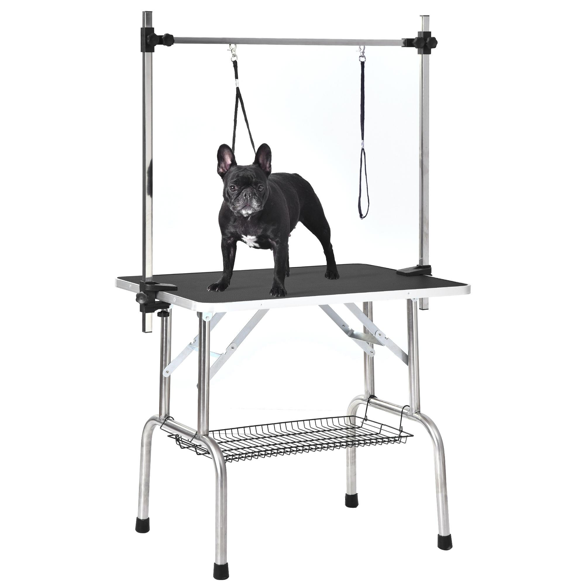 https://assets.wfcdn.com/im/76766116/compr-r85/1440/144065659/folding-dog-pet-grooming-table-with-adjustable-arm-and-tray.jpg