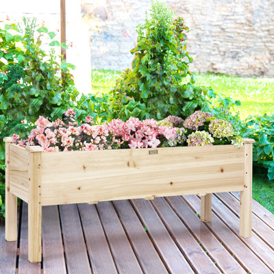 Pot à fleurs surélevé en bois