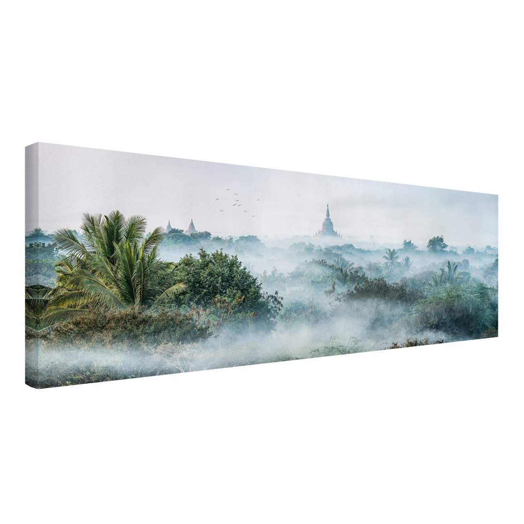 Leinwandbild Morgennebel über dem Dschungel von Bagan von Jan Becke